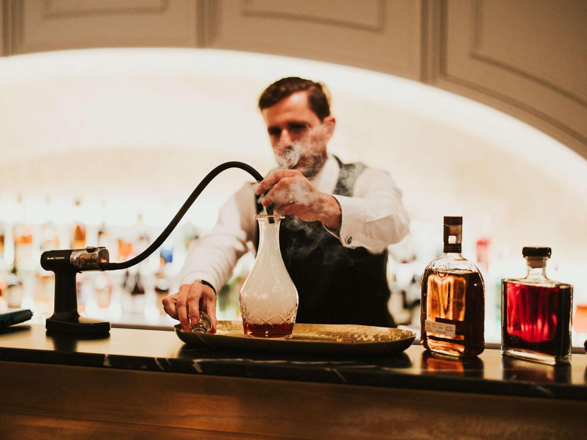 The Playford Adelaide - Mgallery Екстер'єр фото A bartender at work